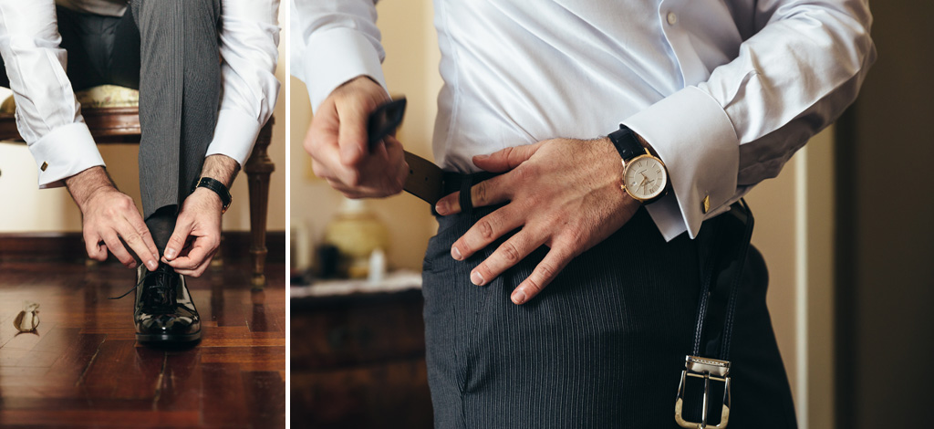 Fotografo Matrimonio Monza Lo sposo indossa la scarpa e la cintura in vista della cerimonia di matrimonio