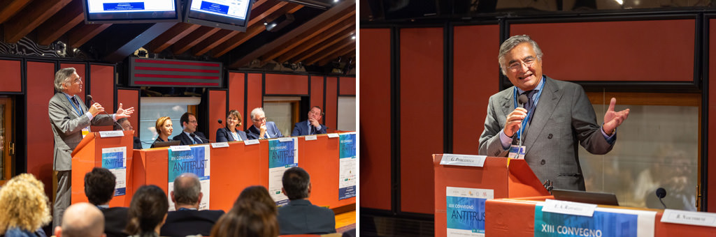 Fotografo Congresso Antitrust Treviso Casa Dei Carraresi L'avvocato Enrico Adriano Raffaelli espone un discorso durante il convegno veneto sull'antitrust fotografato da Alessandro Della Savia