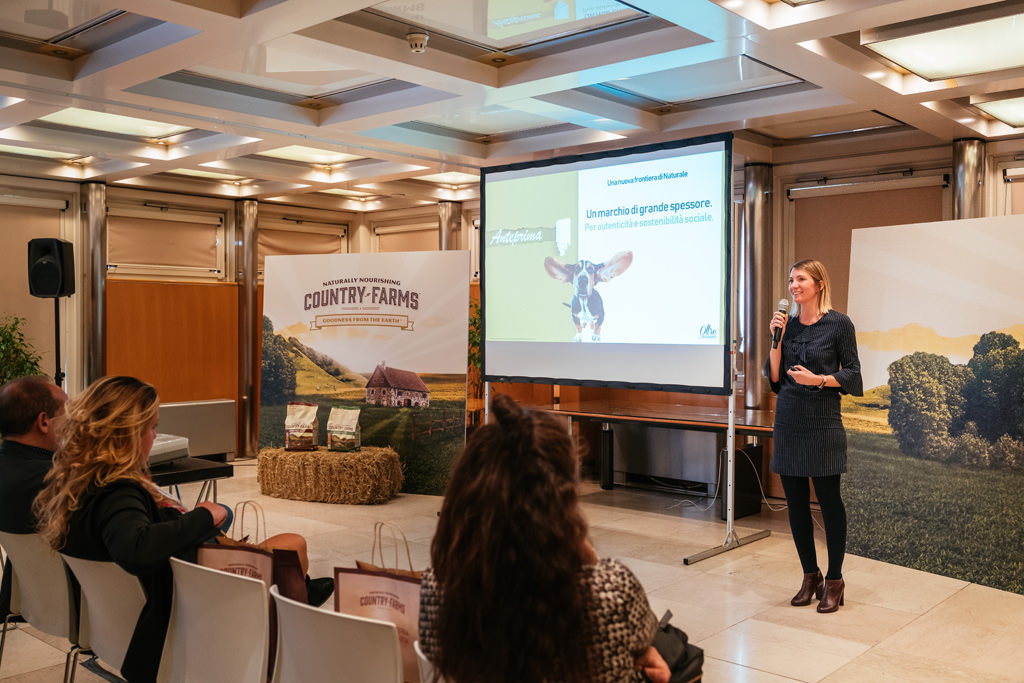 fotografo reportage evento purina zoomark bologna
