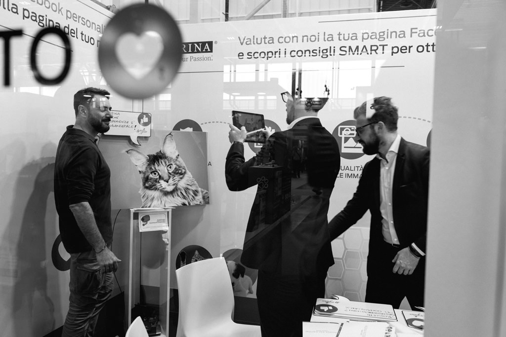 fotografo reportage evento purina zoomark bologna